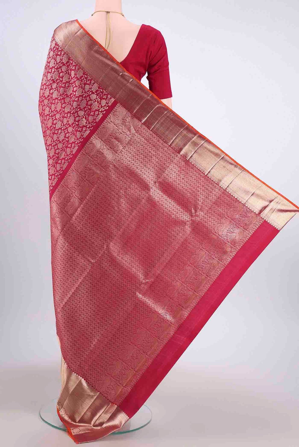 Flat view of Maroon Kanchipuram Silk Saree with Zari Brocade on the body and Zari Border
