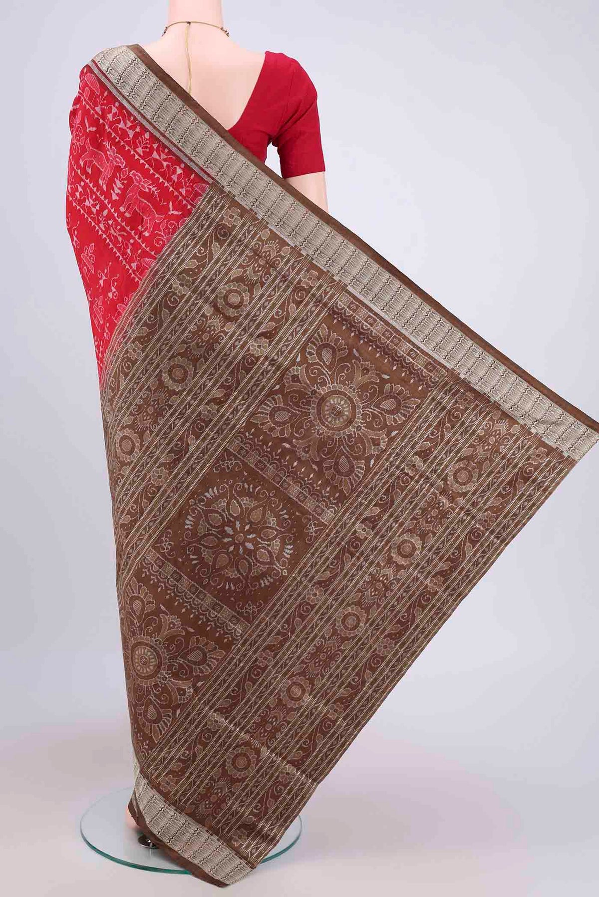 Flat view of Deep Red Orissa Silk Saree with Ikat design on the body and Thread Border. 