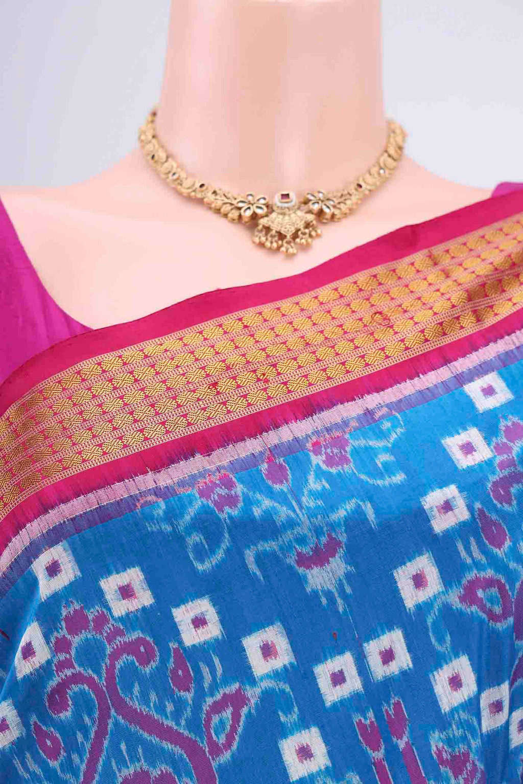 Border image of Blue Orissa Silk Saree with Ikat design on the body and Thread Border. 