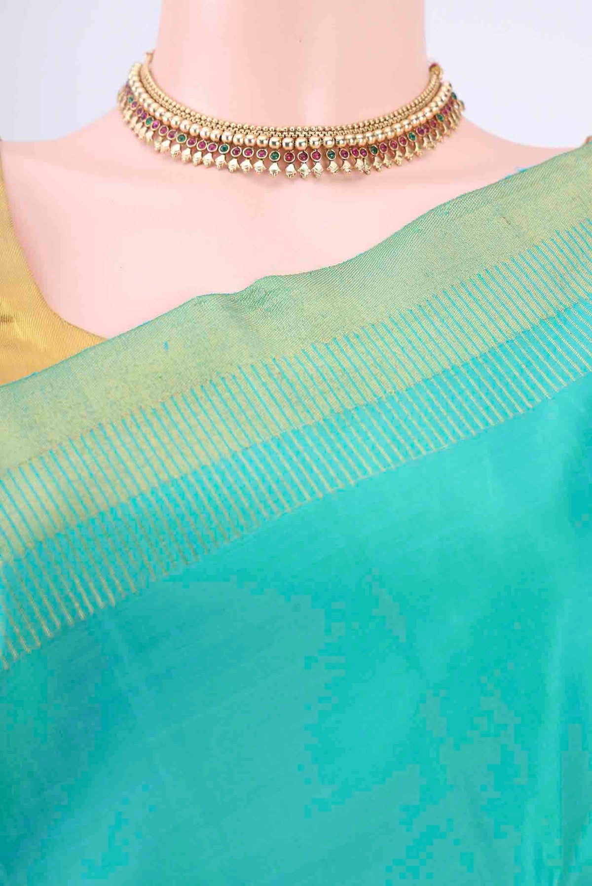 Border image of Pure Silk Pure Zari Sea Green Dual Tone Kanchipuram Saree with Plain Body and Zari Border