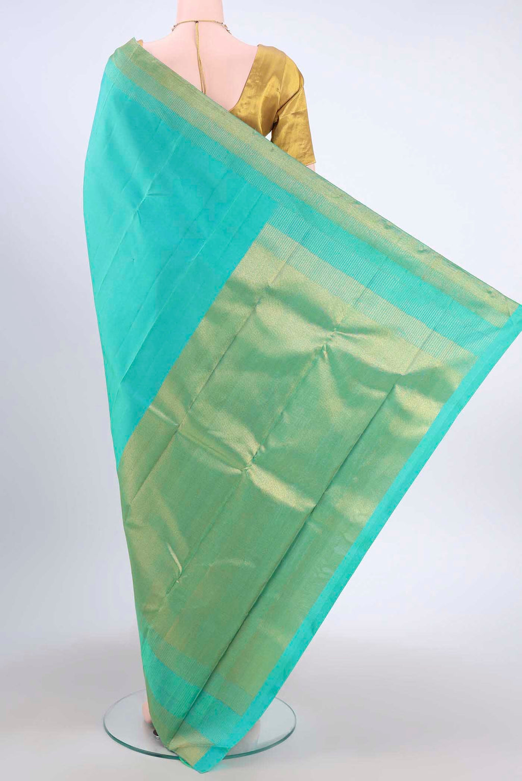 Flat view of Pure Silk Pure Zari Sea Green Dual Tone Kanchipuram Saree with Plain Body and Zari Border