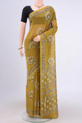 Mehandi Green Chanderi Silk Saree with Printed design on the body and Zari Border.  displayed on a mannequin