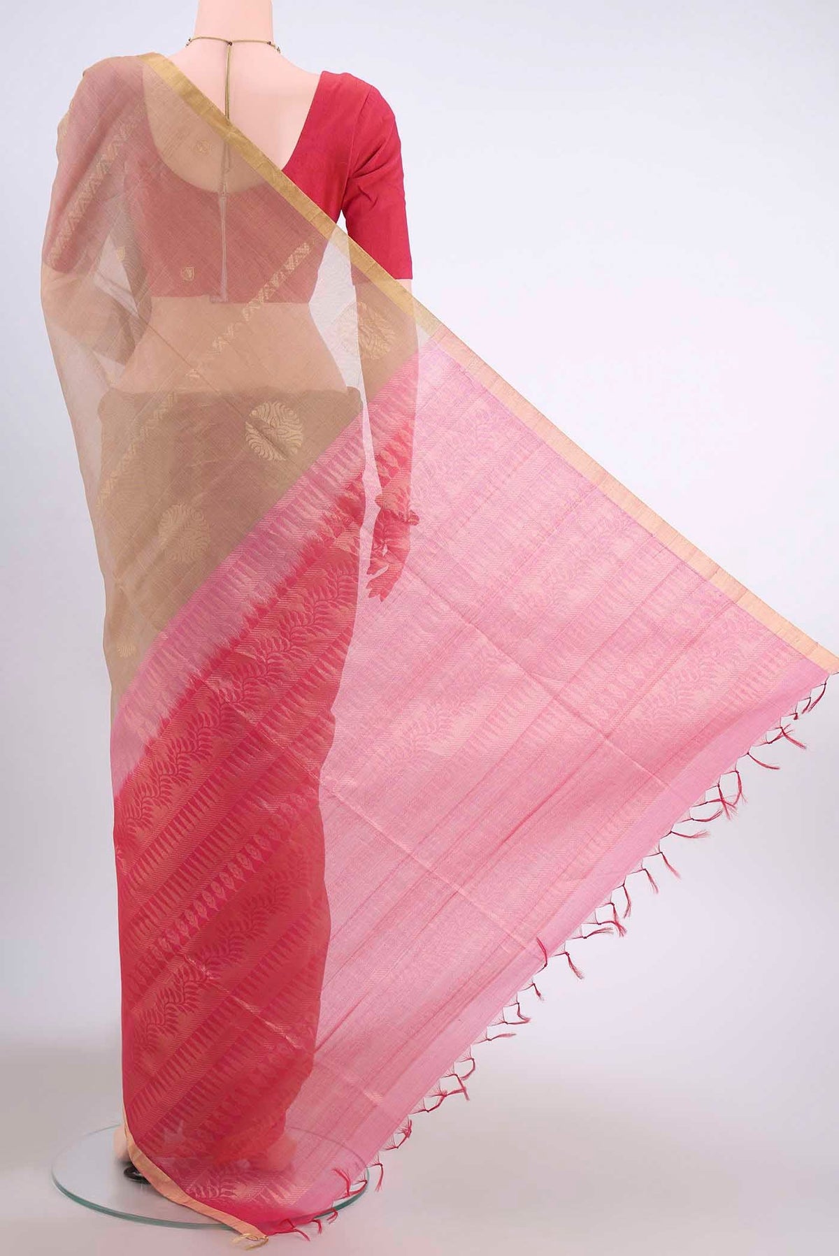 Flat view of Dark Beige Kora Cotton Saree with Zari Butta on the body and Zari Border