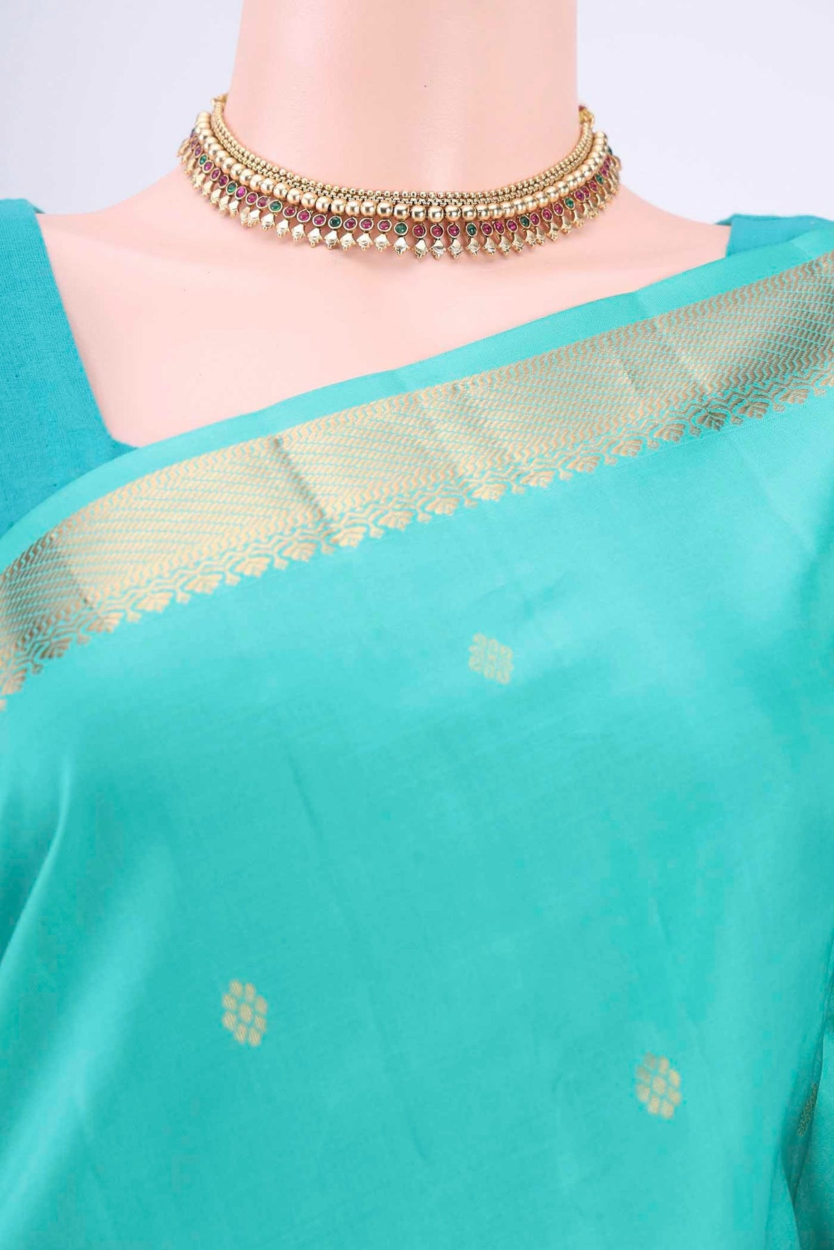Border image of Turquoise Kanchipuram Silk Saree with Zari Butta on the body and Zari Border