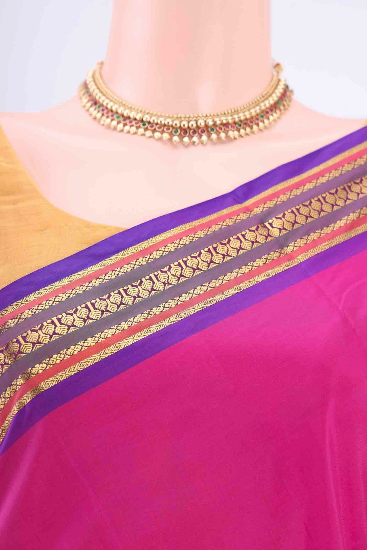 Border image of Rani Pink Dual Tone Blended Bangalore Silk Saree with Plain Body and Zari Border