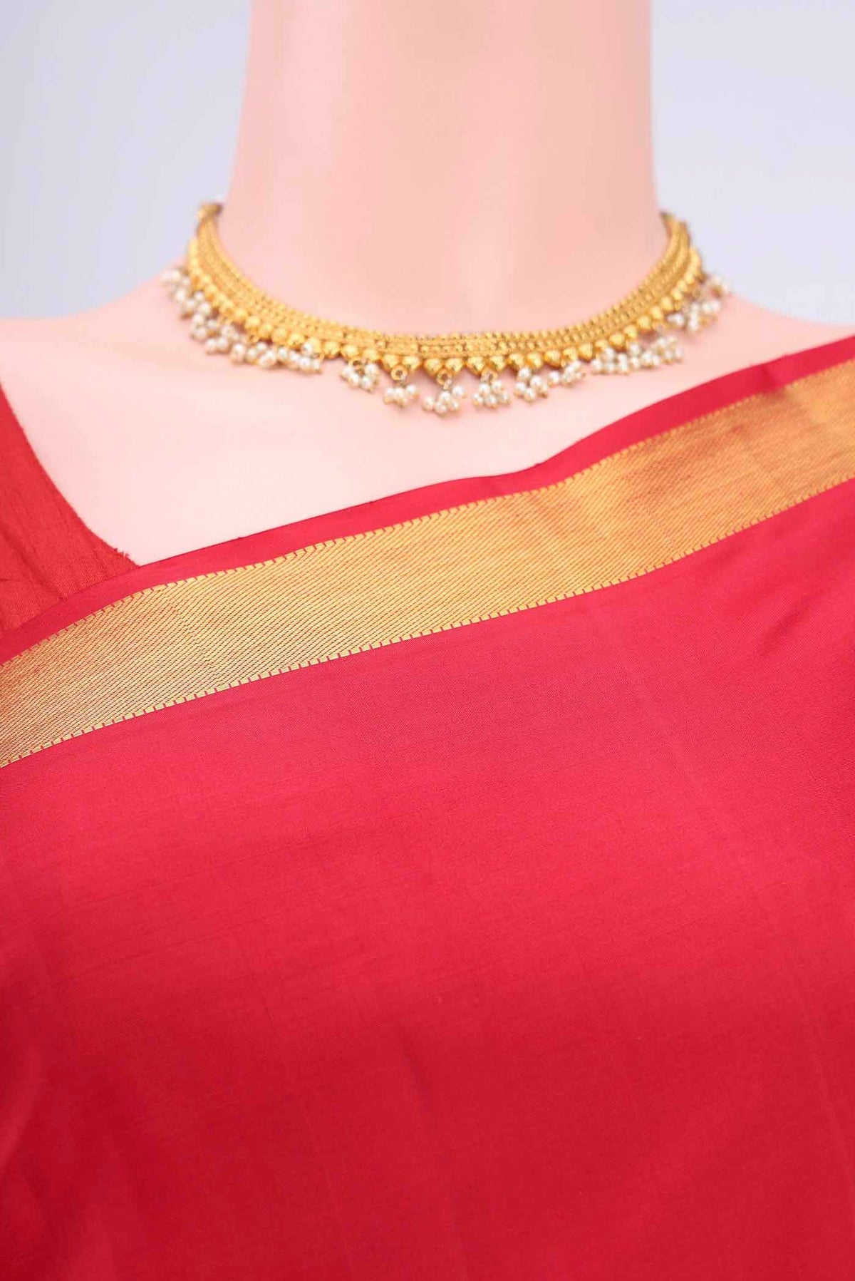 Border image of Red Kanchipuram Saree with Plain Body and Zari Border