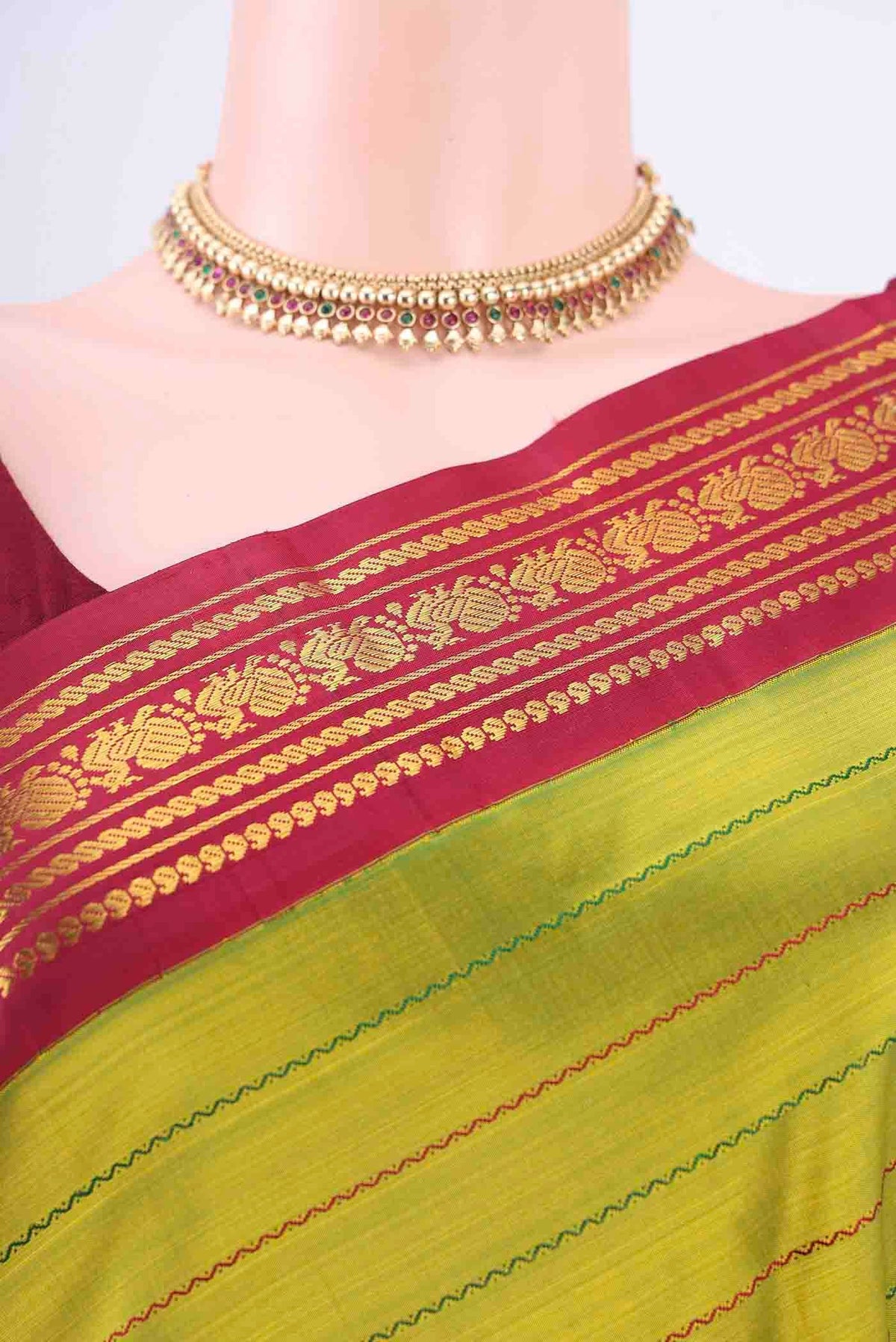 Border image of Light Green Kanchipuram Silk Saree with Stripes on the body and Zari Border