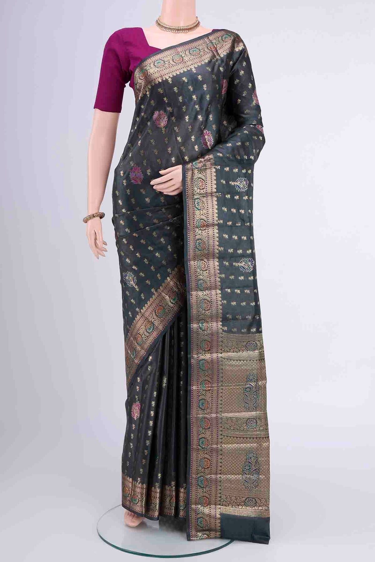 Davys Grey Banarasi Tussar Silk Saree with Zari Butta on the body and Zari Border displayed on a mannequin