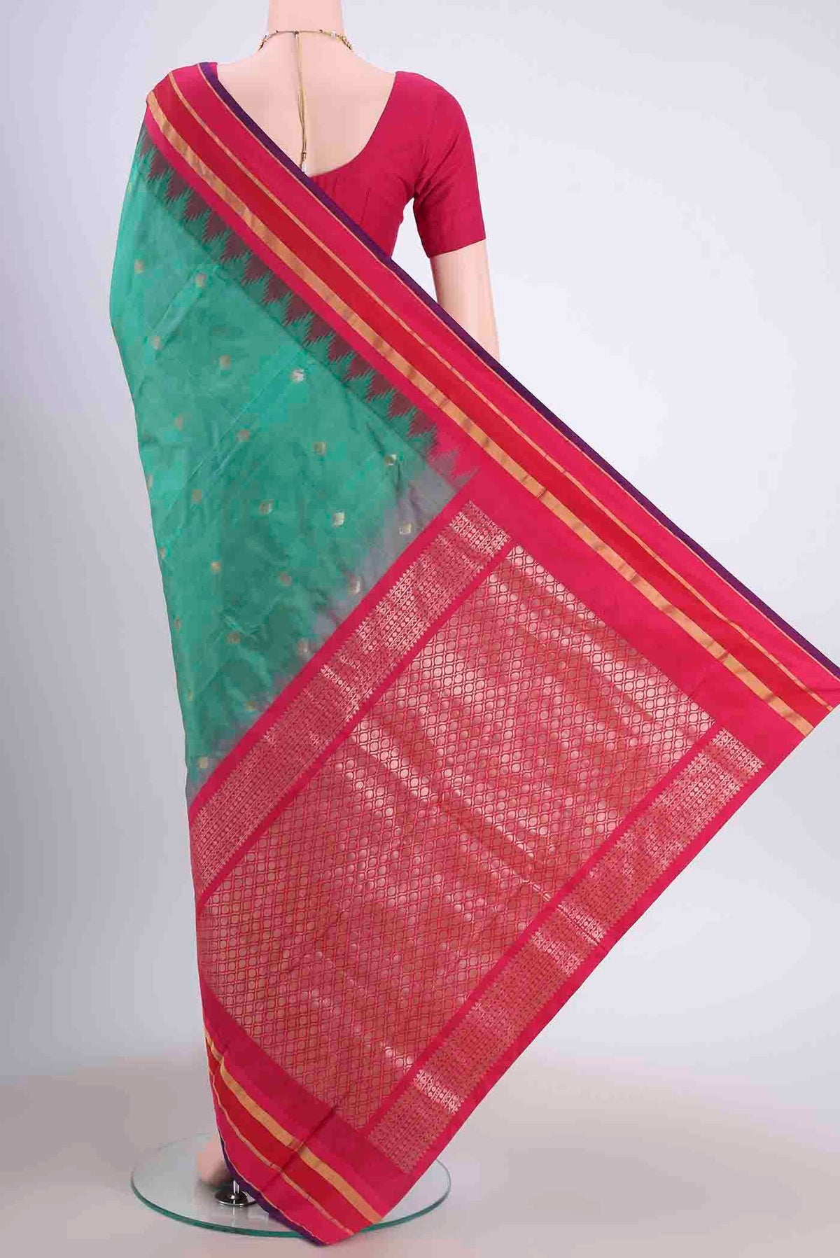 Flat view of Sea Green Blended Bangalore Silk Saree with Zari Butta on the body and Temple Border
