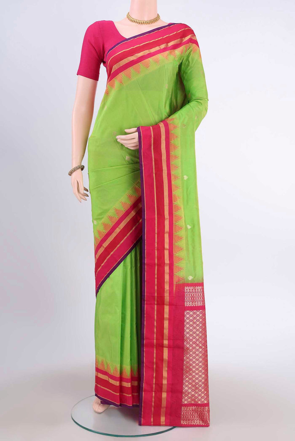 Parrot Green Dual Tone Blended Bangalore Silk Saree with Zari Butta on the body and Temple Border displayed on a mannequin