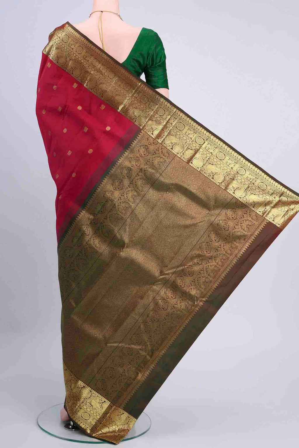 Flat view of Dark Pink Kanchipuram Saree with Zari Butta on the body and Zari Border