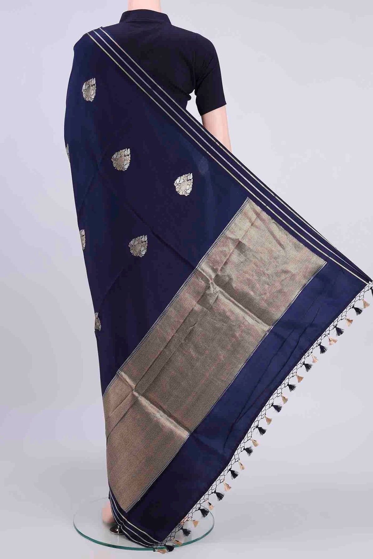Flat view of Navy Blue Banarasi Silk Saree with Zari Butta on the body and Satin Border