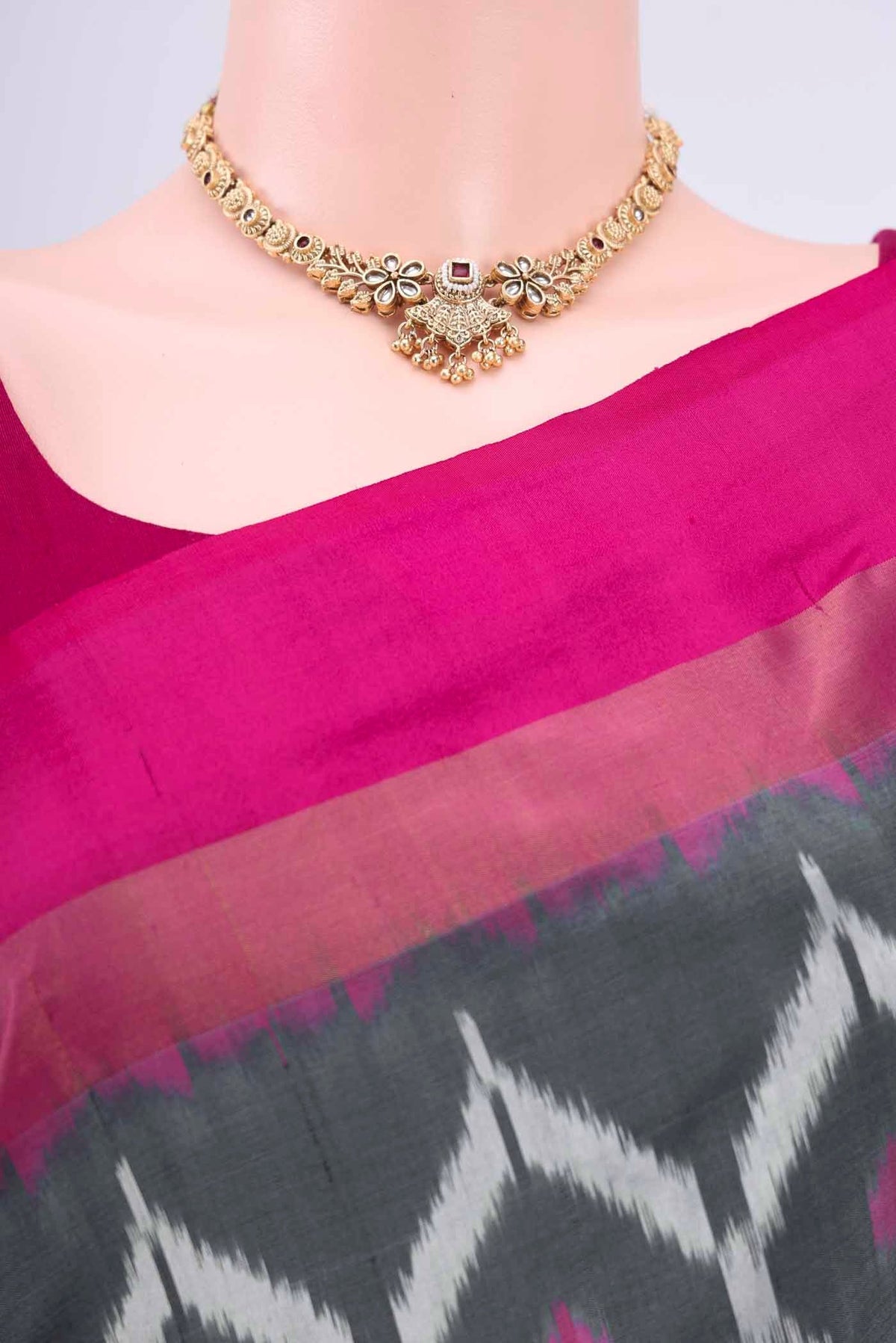 Border image of Grey Pochampally Saree with Plain Body and Ikat Border
