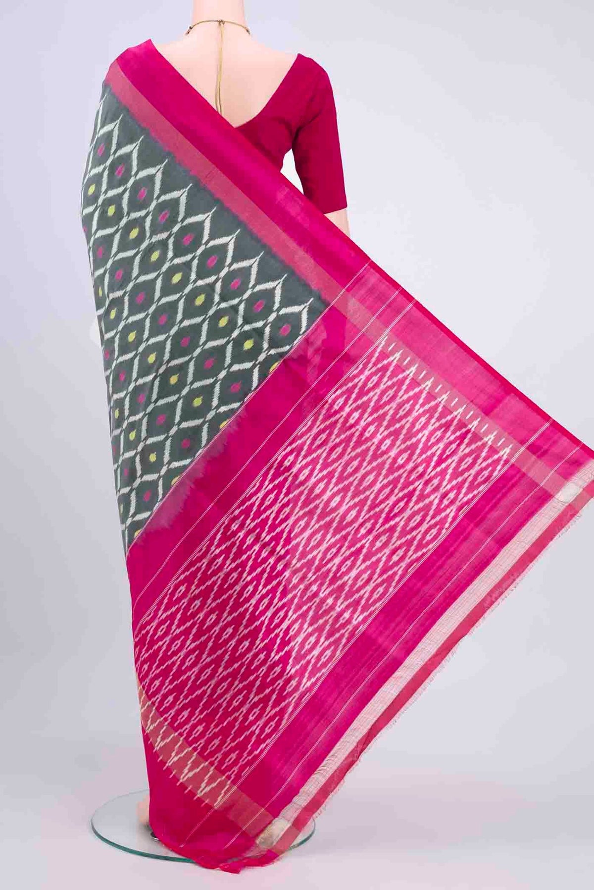 Flat view of Grey Pochampally Saree with Plain Body and Ikat Border