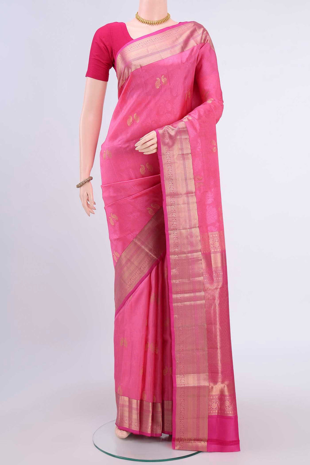 Rose pink Soft Silk Saree with Jacquard With Zari Butta on the body and Zari Border displayed on a mannequin