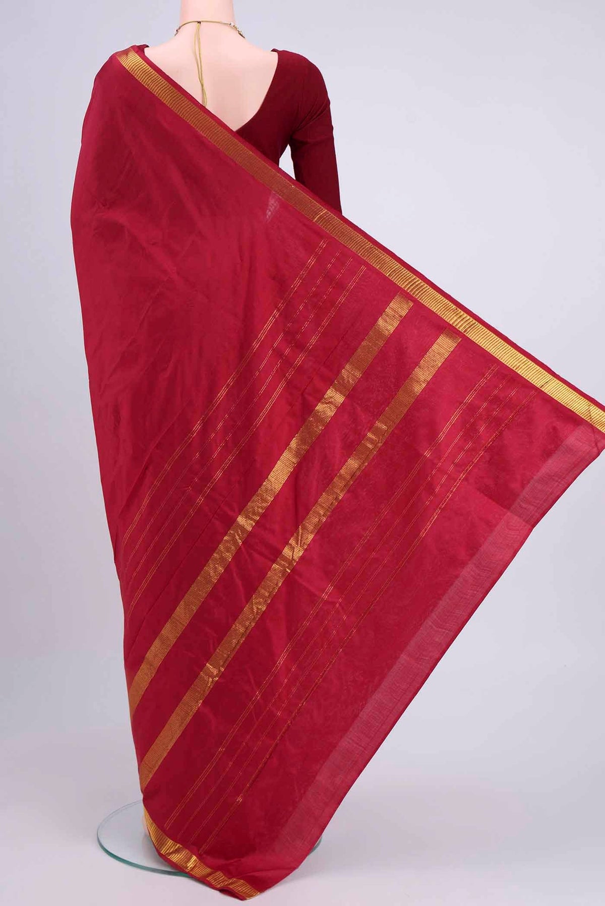 Flat view of Red Kanchipuram Saree with Plain Body and Zari Border