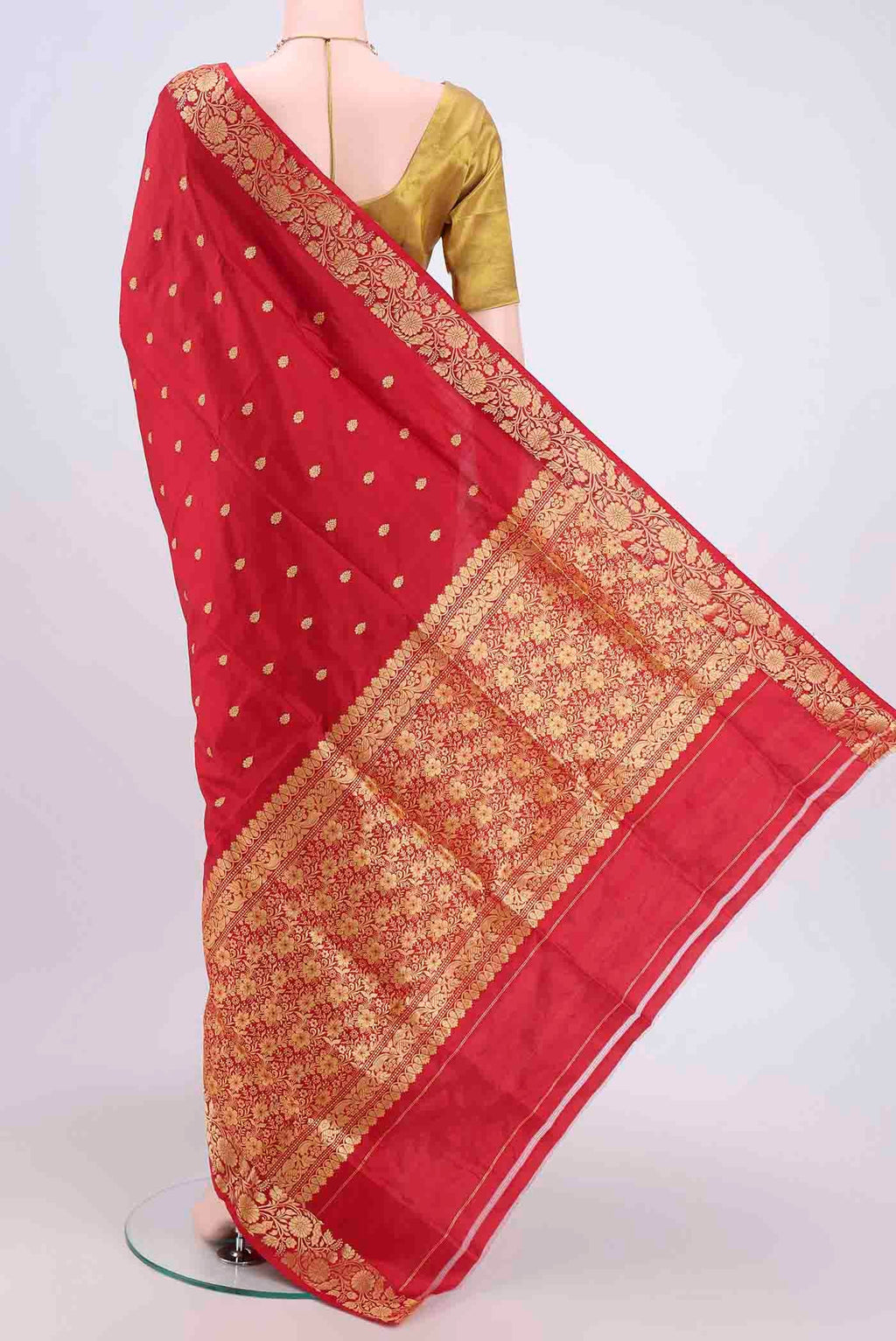 Flat view of Maroon Dual Tone Banarasi Katan Silk Saree with Zari Butta on the body and Zari Border. 