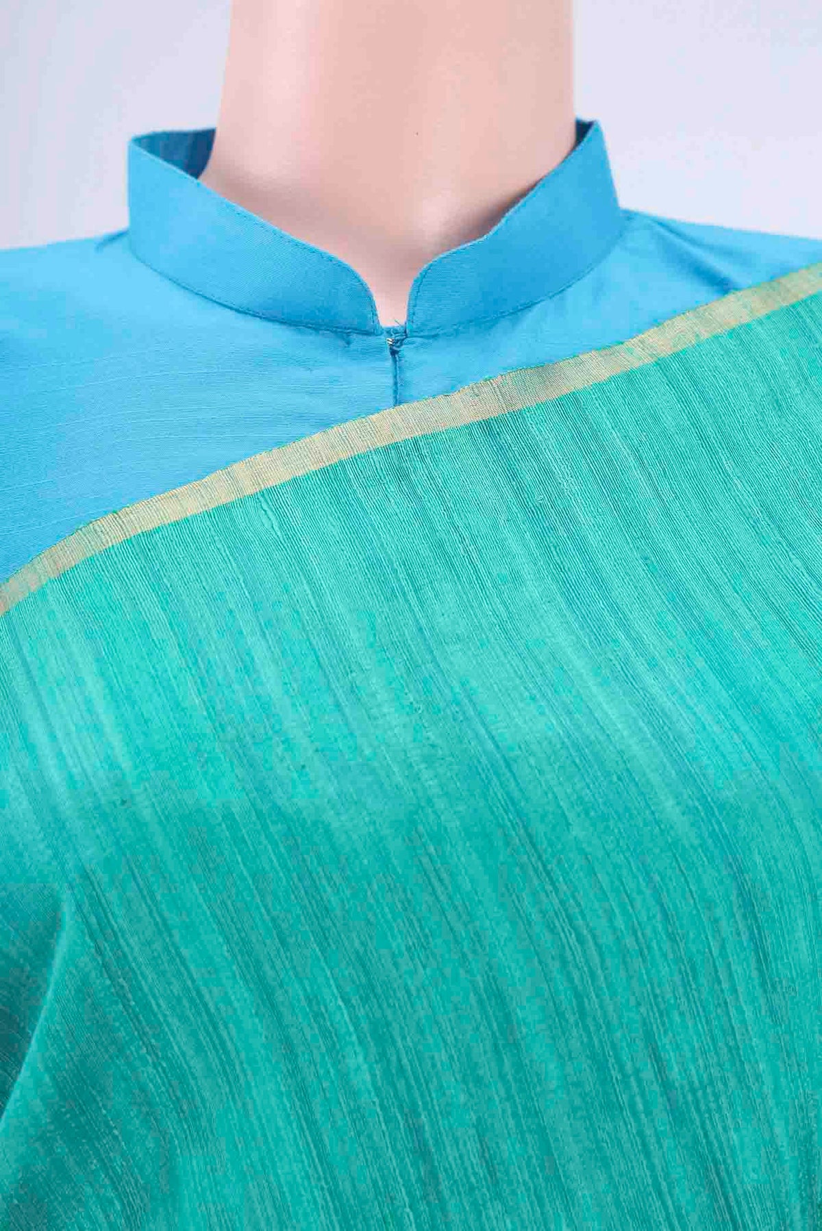 Border image of Turquoise and Green Color Banarasi Tussar Silk Saree with Ombre design on the body and Thin Zari Line