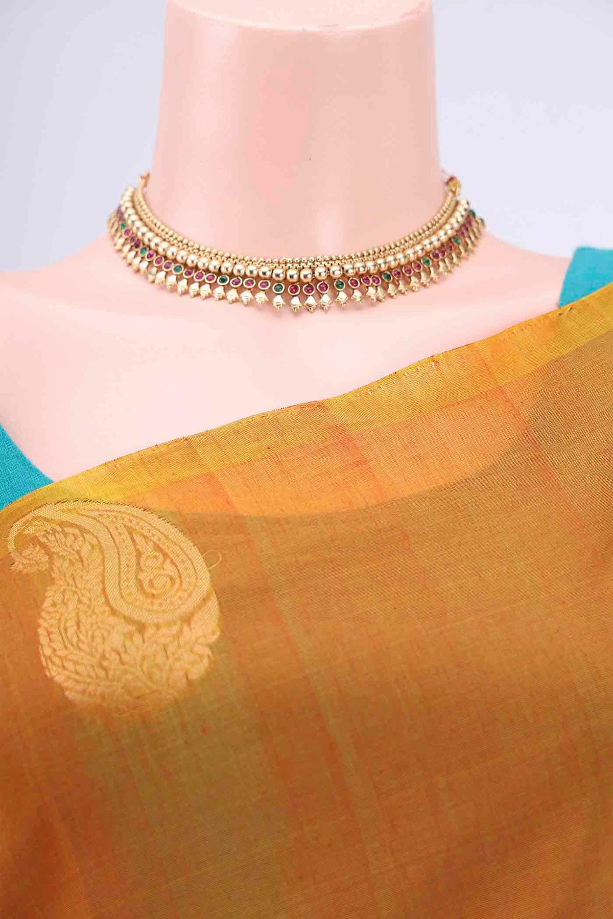 Border image of Mustard Kora Cotton Saree with Zari Butta on the body and Zari Border. 