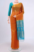 Mustard Kora Cotton Saree with Zari Butta on the body and Zari Border.  displayed on a mannequin