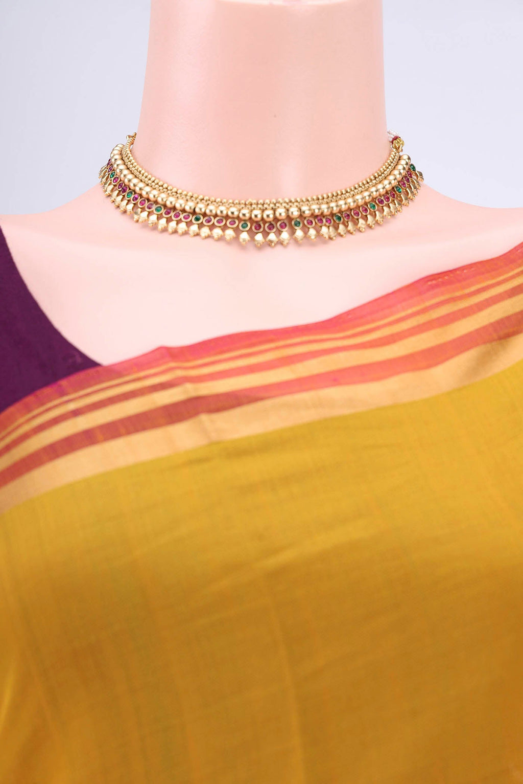Border image of Yellow Kora Cotton Saree with Zari Butta on the body and Zari Border. 