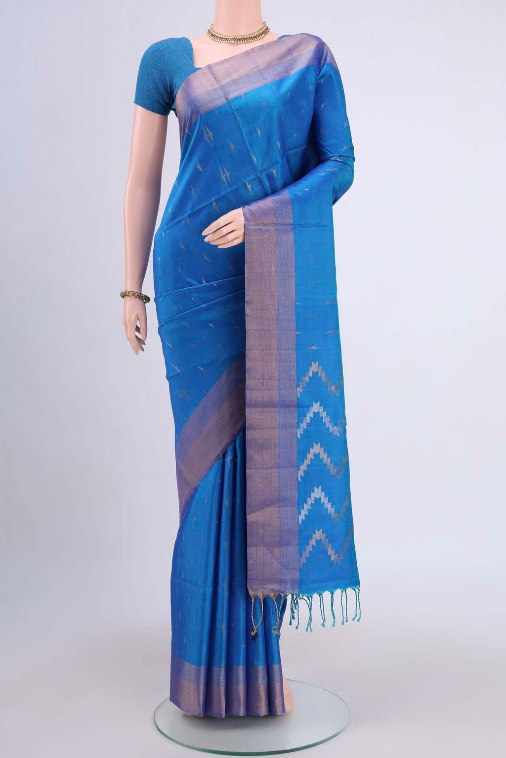 Blue Dual Tone Soft Silk Saree with Zari Butta on the body and Zari Border displayed on a mannequin
