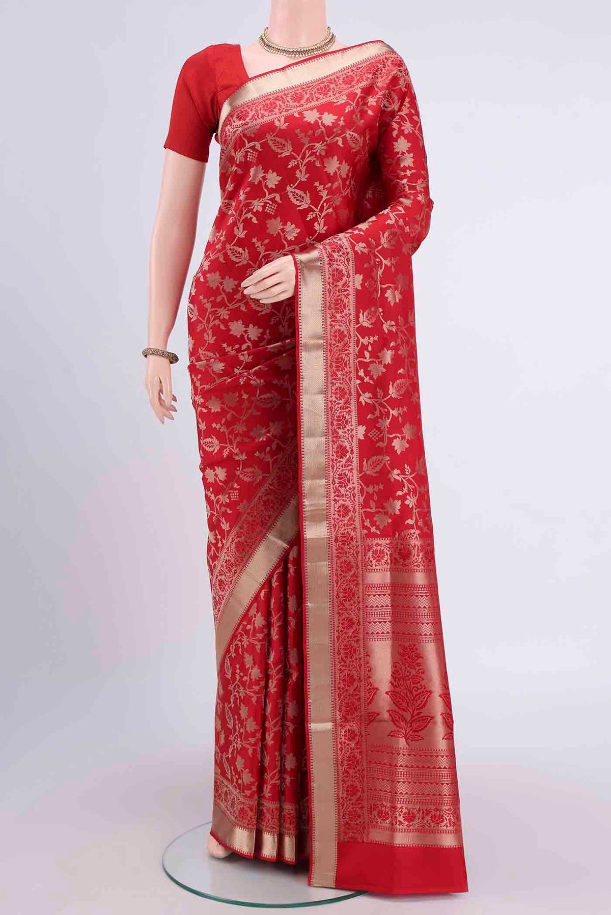 Deep Red Soft Silk Saree with Zari Brocade on the body and Zari Border displayed on a mannequin