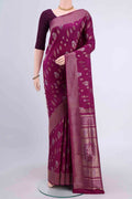Magenta Soft Silk Saree with Zari Butta on the body and Fancy Border displayed on a mannequin