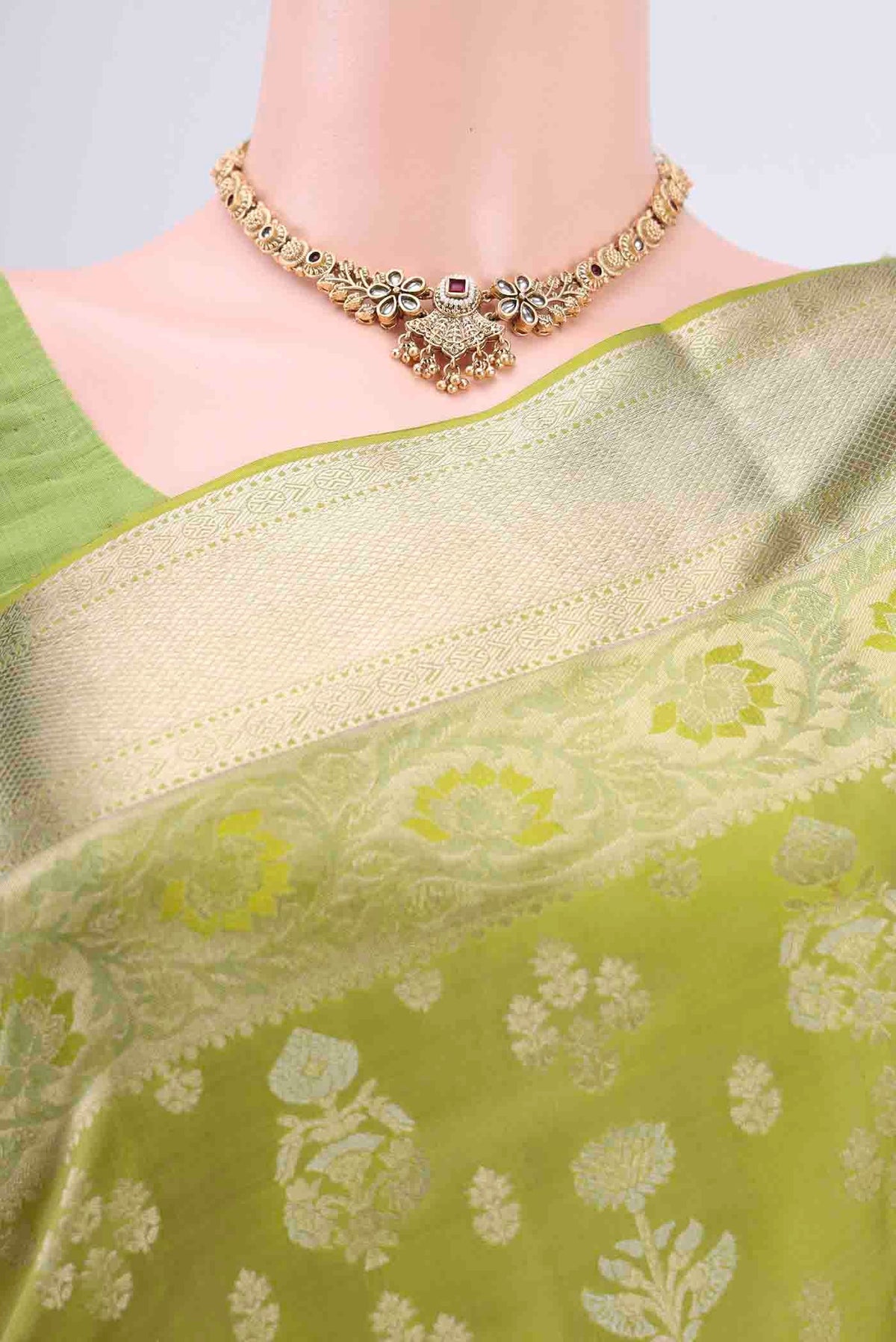 Border image of Light Green Soft Silk Saree with Zari Butta on the body and Zari Border