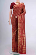 Maroon Soft Silk Saree with Zari Brocade on the body and Zari Border displayed on a mannequin