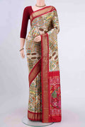 Cream Pochampally Silk Saree with Pure Ikat on the body and Zari Border displayed on a mannequin