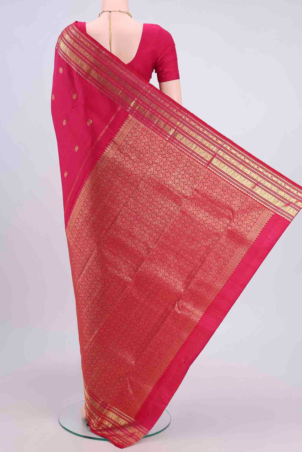Flat view of Dark Pink Kanchipuram Silk Saree with Zari Butta on the body and Zari Border