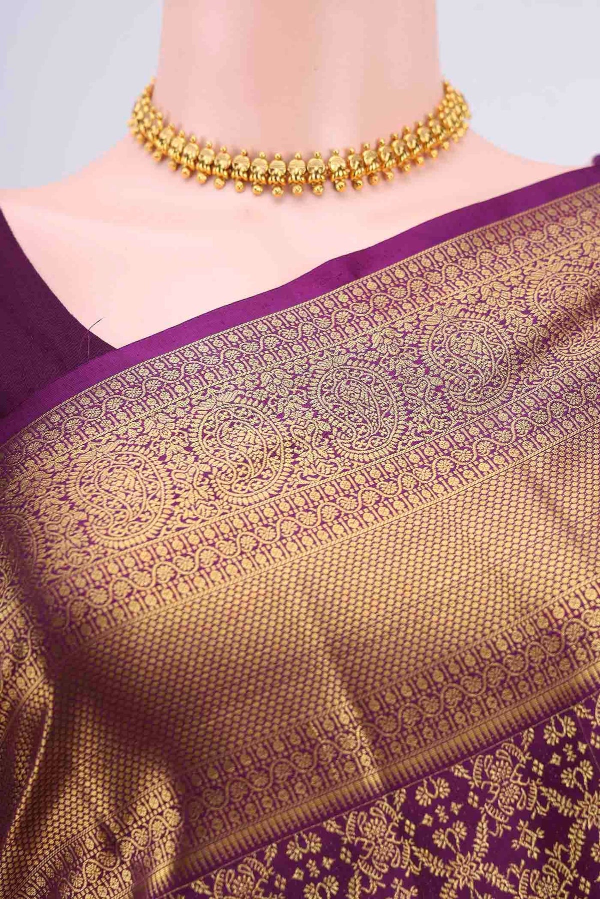 Border image of Purple Kanchipuram Silk Saree with Zari Brocade on the body and Zari Border