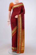 Maroon Blended Bangalore Silk Saree with Zari Butta on the body and Zari Border.  displayed on a mannequin