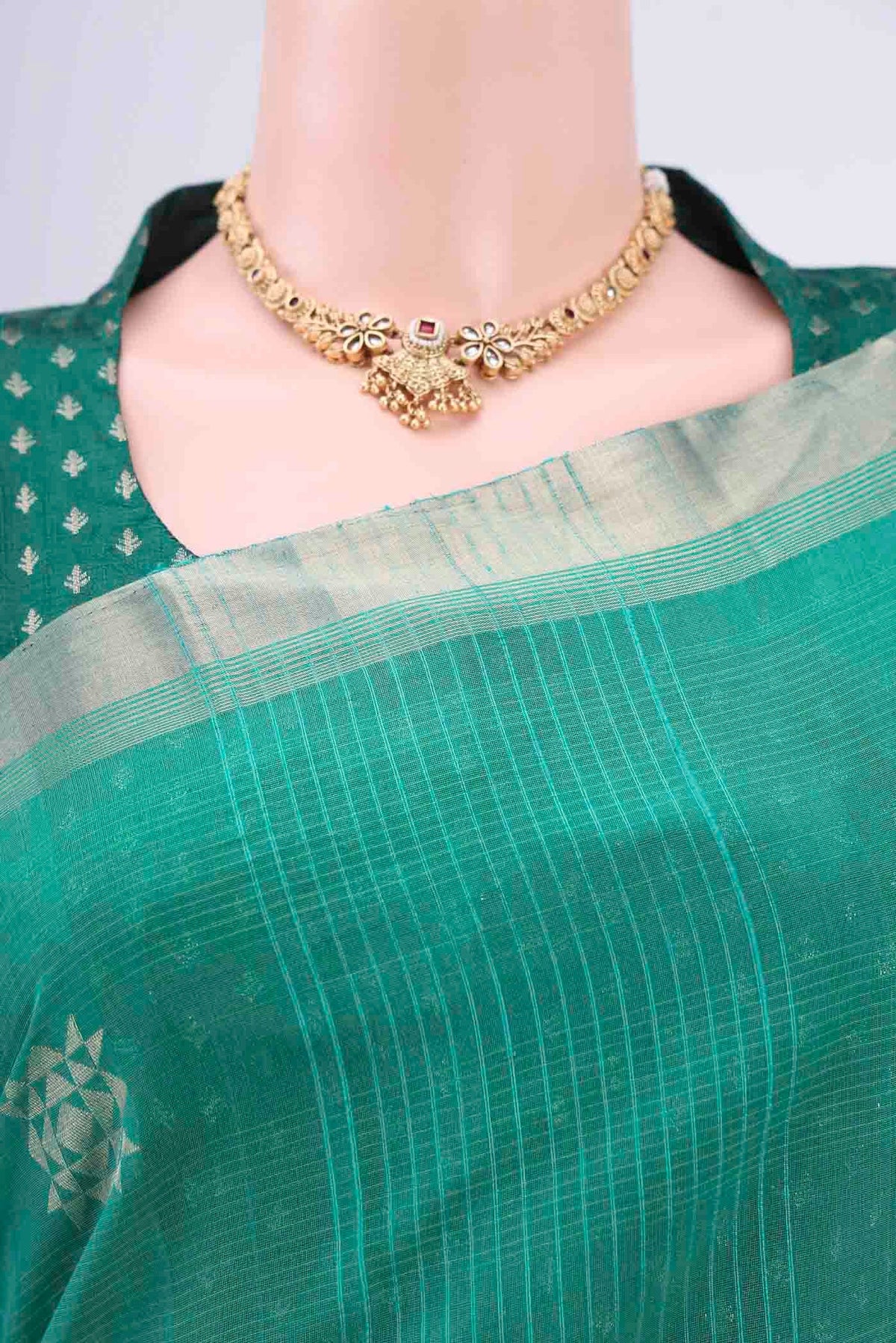 Border image of Sea Green Kora Cotton Saree with Zari Butta on the body and Zari Border. 