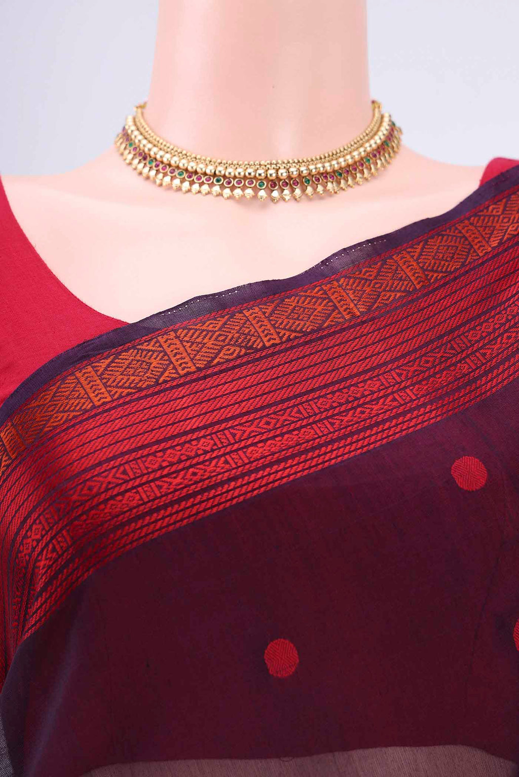 Border image of Dark Mauve Kora Cotton Saree with Zari Butta on the body and Zari Border. 
