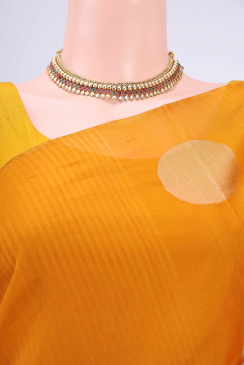 Border image of Mustard Kora Cotton Saree with Zari Butta on the body and Zari Border. 