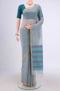 Blue Grey Silk Cotton Saree with Plain Body and Zari Border.  displayed on a mannequin
