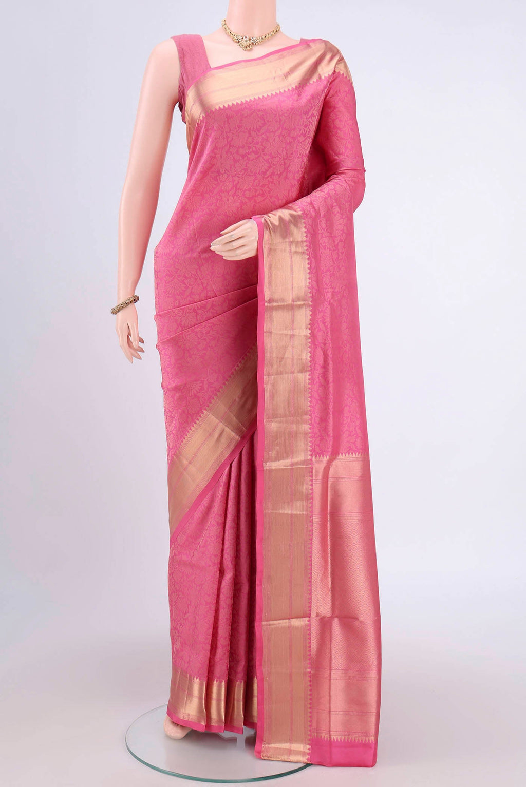 Pink Soft Silk Saree with Zari Brocade on the body and Zari Border.  displayed on a mannequin