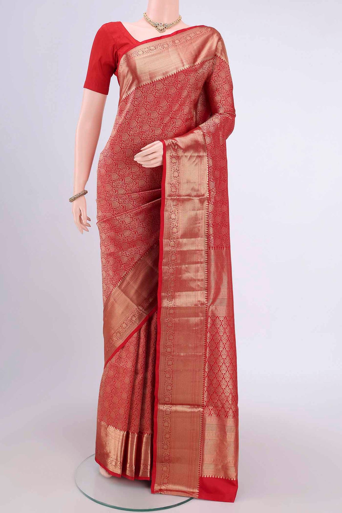 Red Soft Silk Saree with Zari Brocade on the body and Zari Border.  displayed on a mannequin