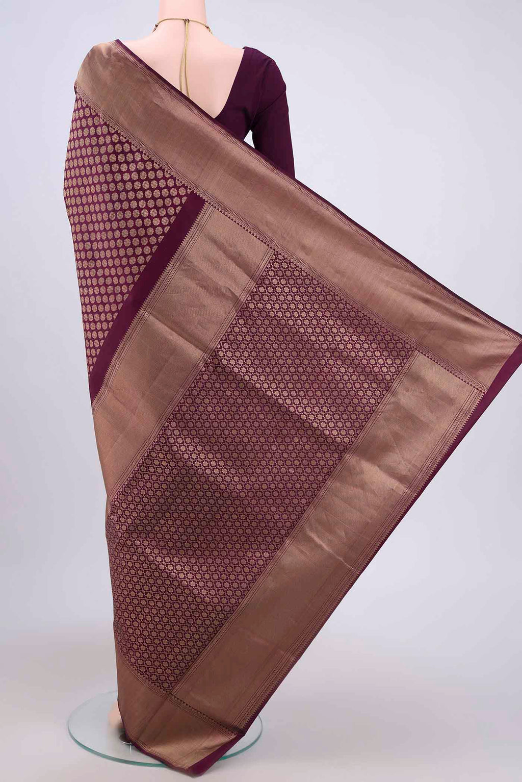 Flat view of Purple Soft Silk Saree with Zari Brocade on the body and Zari Border. 