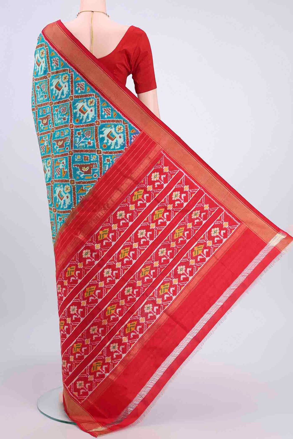 Flat view of Blue Pochampally Silk Saree with Pure Ikat on the body and Zari Border