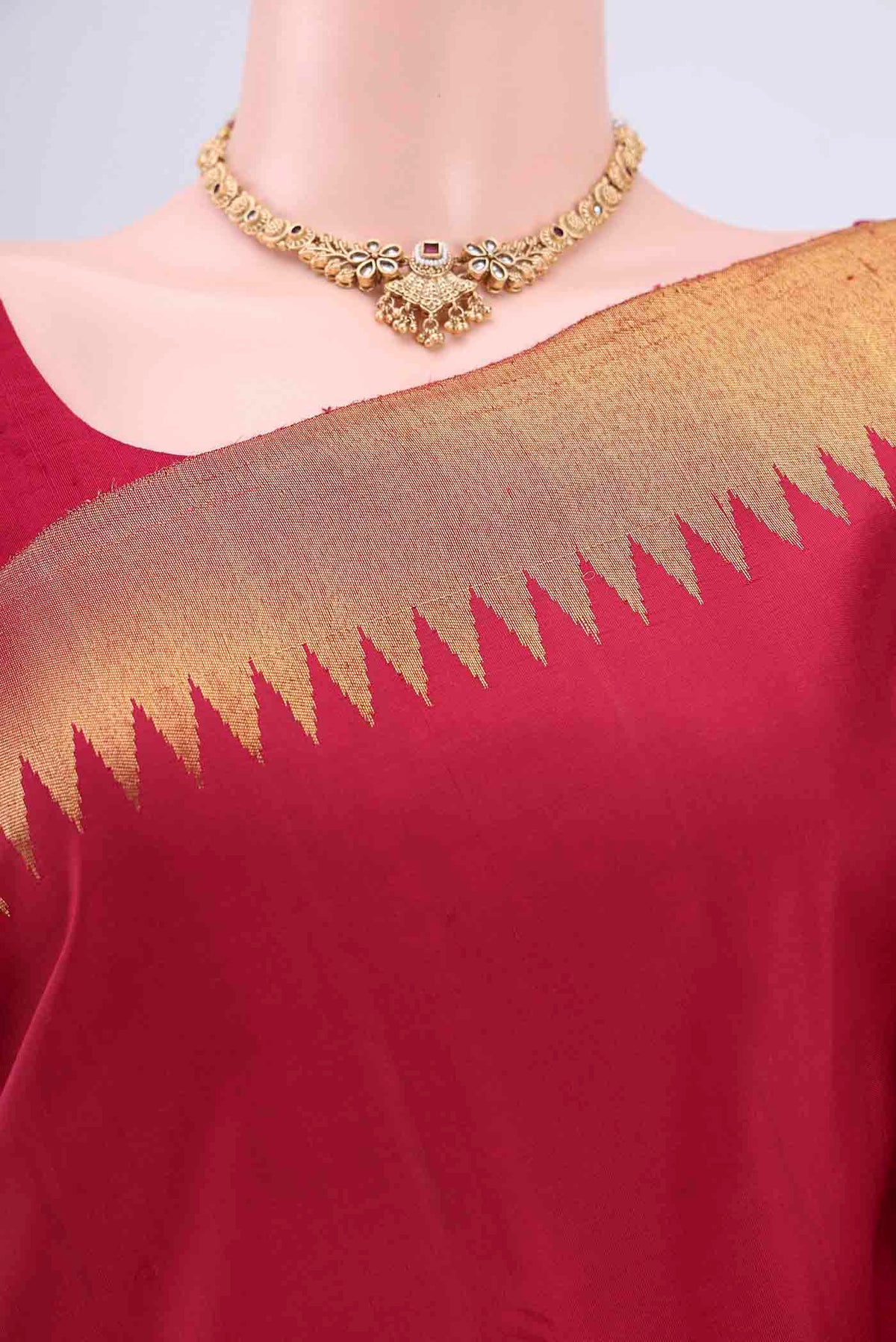 Border image of Maroon Dual Tone Kanjivaram Saree with Plain Body and Fancy Border. 