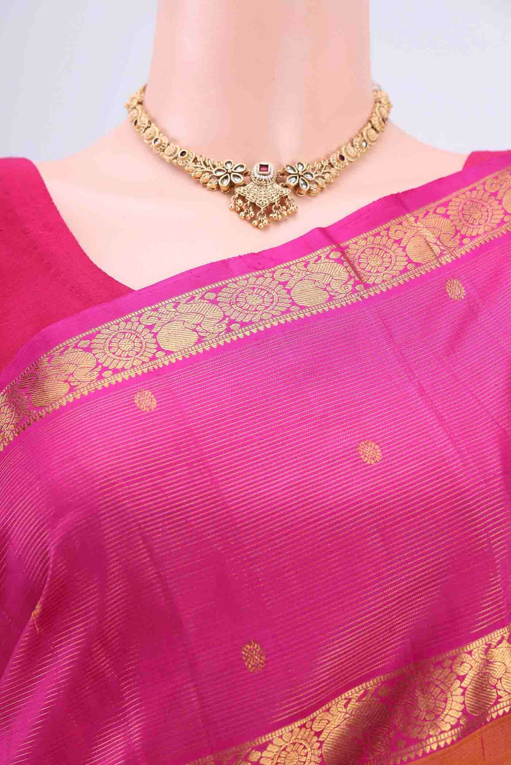 Border image of Brick Orange Kanchipuram Saree with Zari Butta on the body and Zari Border