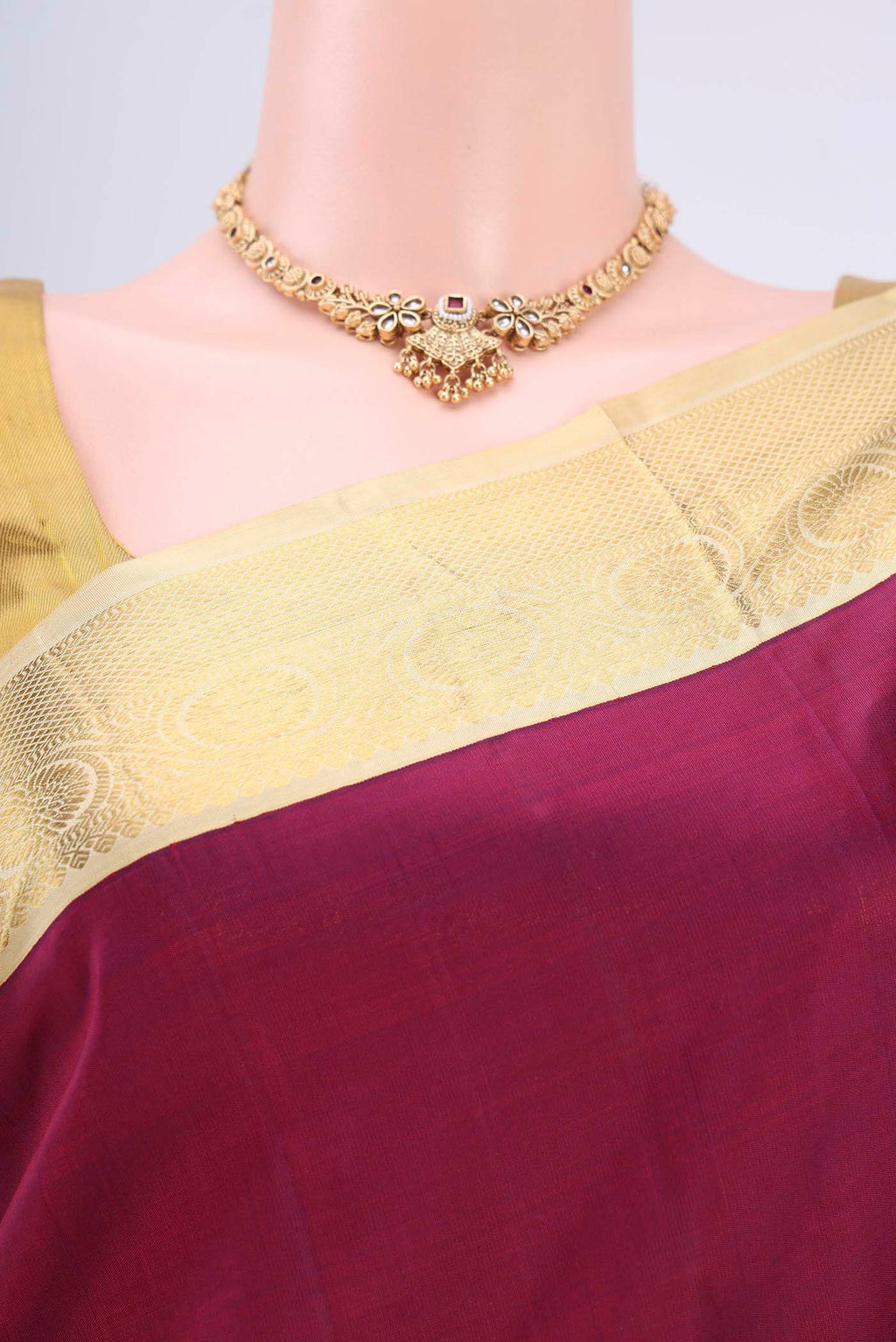Border image of Burgundy Dual Tone Kanjivaram Saree with Plain Body and Zari Border. 