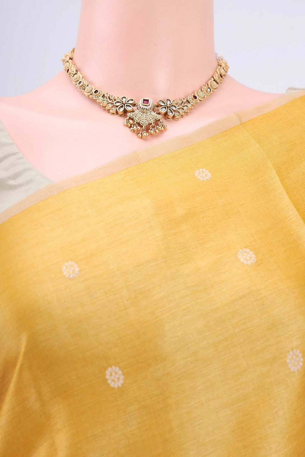 Border image of Lemon Yellow Tussar Silk Saree with Thread Butta on the body and Plain Border