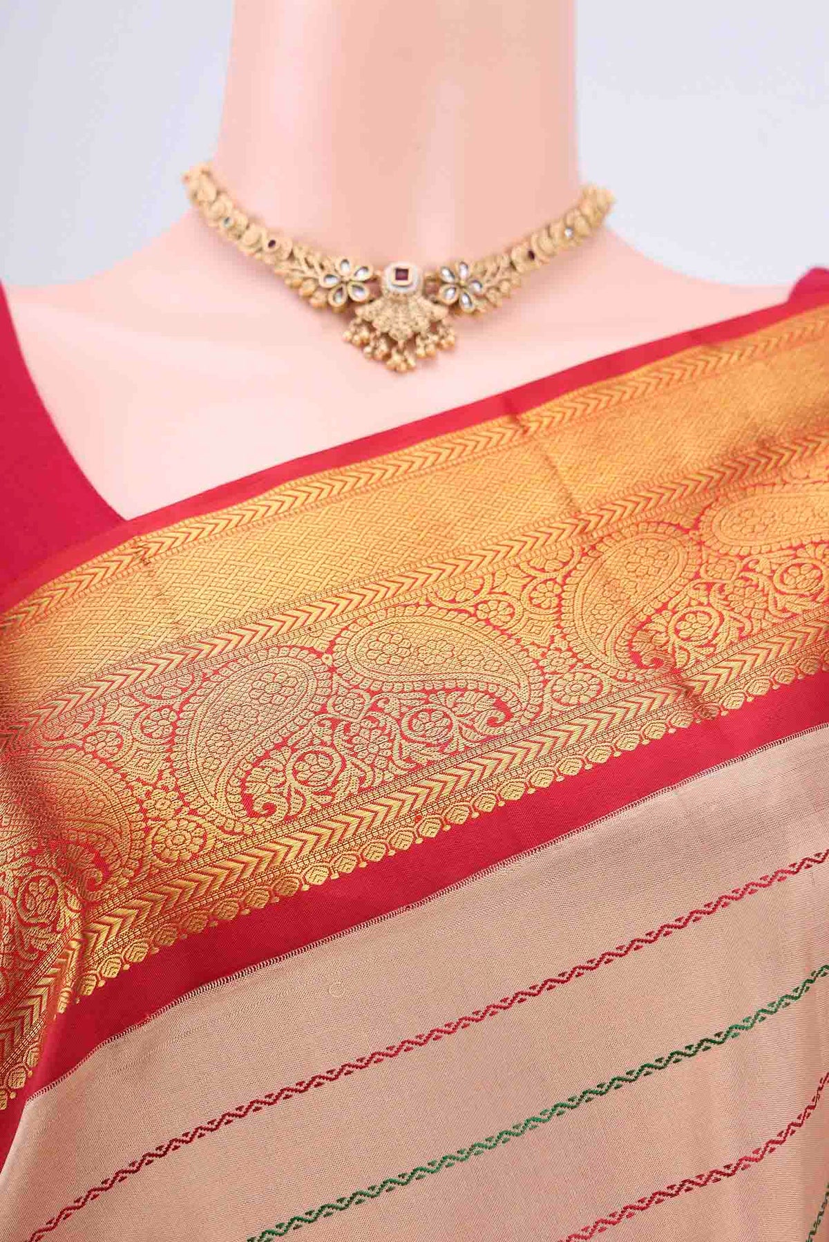 Border image of Beige Dual Tone Kanjivaram Silk Saree with Stripes on the body and Zari Border. 