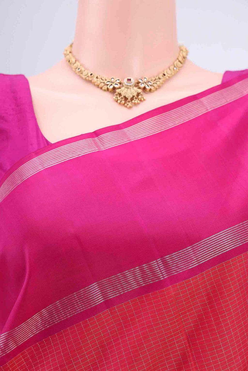 Border image of Dark Pink Kanchipuram Silk Saree with Checked design on the body and Zari Border. 