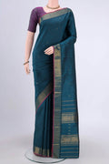 Peacock Blue Kanchipuram Saree with Zari Butta on the body and Zari Border.  displayed on a mannequin