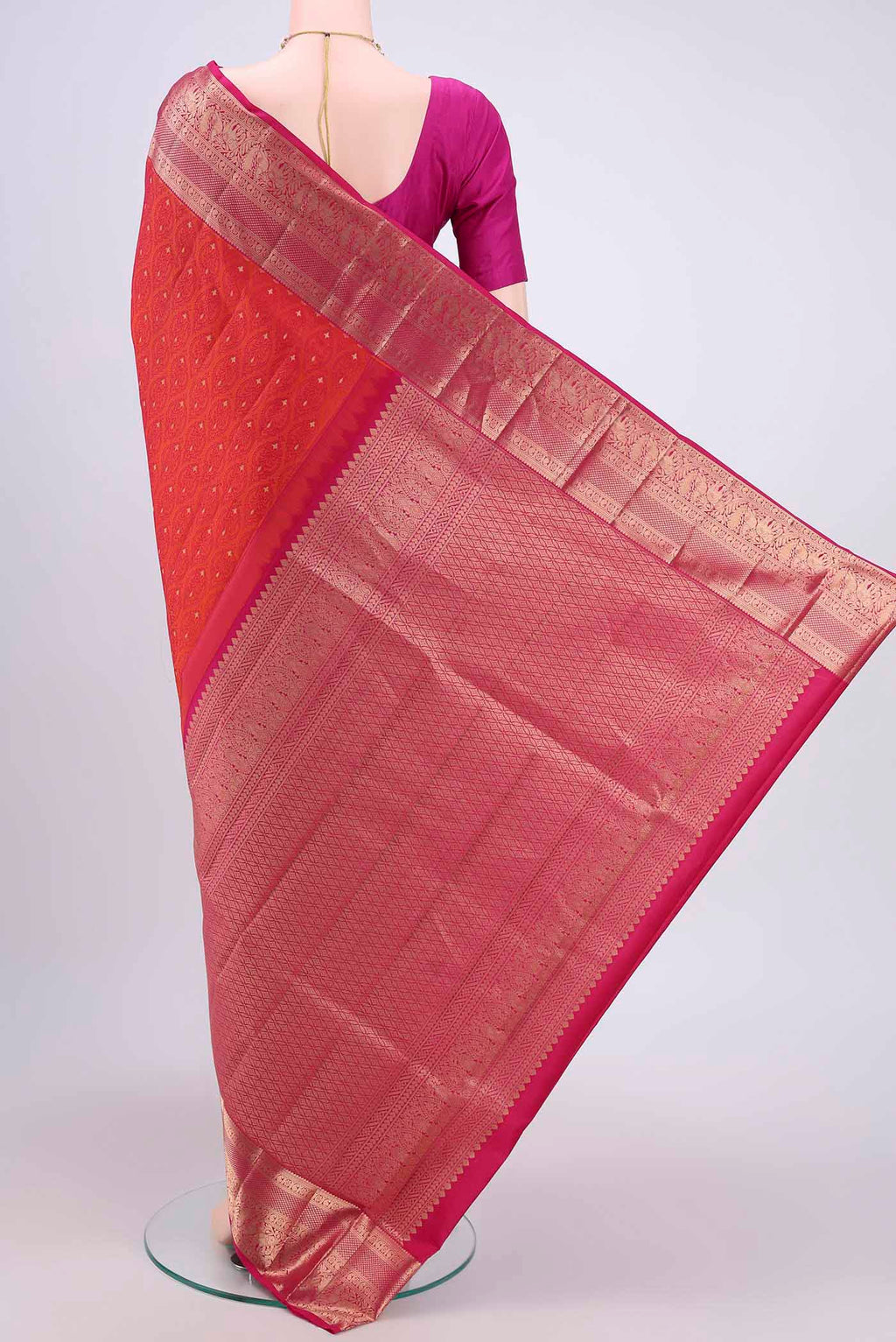 Flat view of Rust Dual Tone Soft Silk Saree with Jacquard With Zari Butta on the body and Zari Border. 
